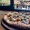 a plate of pizza near a window